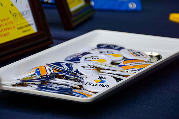 A box of Emory buttons and pins